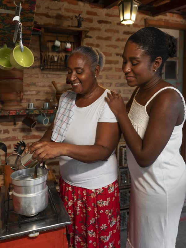 side-view-brazilian-family-cooking-tasty-desserts